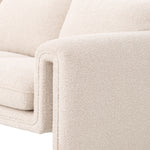 Eichholtz Sofa Tondo bouclé cream Anchor your living room in contemporary style and impeccable comfort with the Tondo Sofa. Consisting