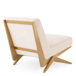 Eichholtz Chair Fico bouclé cream Chair Fico pairs quality with simplicity. This stylish armless lounge chair is a contemporary steel