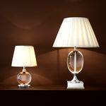 Eichholtz Table Lamp Octavia Crystal Bring simple elegance into your home with the understated Octavia Table Lamp. The crystal glass ball