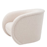 Eichholtz Swivel Chair Cristo bouclé cream Enjoy the soft embrace of the curvy Chair Cristo in our faux fur bouclé cream fabric with a round br
