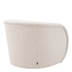 Eichholtz Swivel Chair Cristo bouclé cream Enjoy the soft embrace of the curvy Chair Cristo in our faux fur bouclé cream fabric with a round br