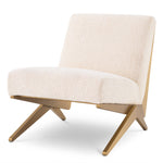 Eichholtz Chair Fico bouclé cream Chair Fico pairs quality with simplicity. This stylish armless lounge chair is a contemporary steel