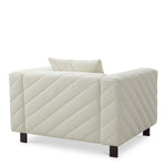 Eichholtz Chair Avellino rêve cream Elevate your living space with the Eichholtz Avellino Armchair, upholstered in luxurious Rêve cream