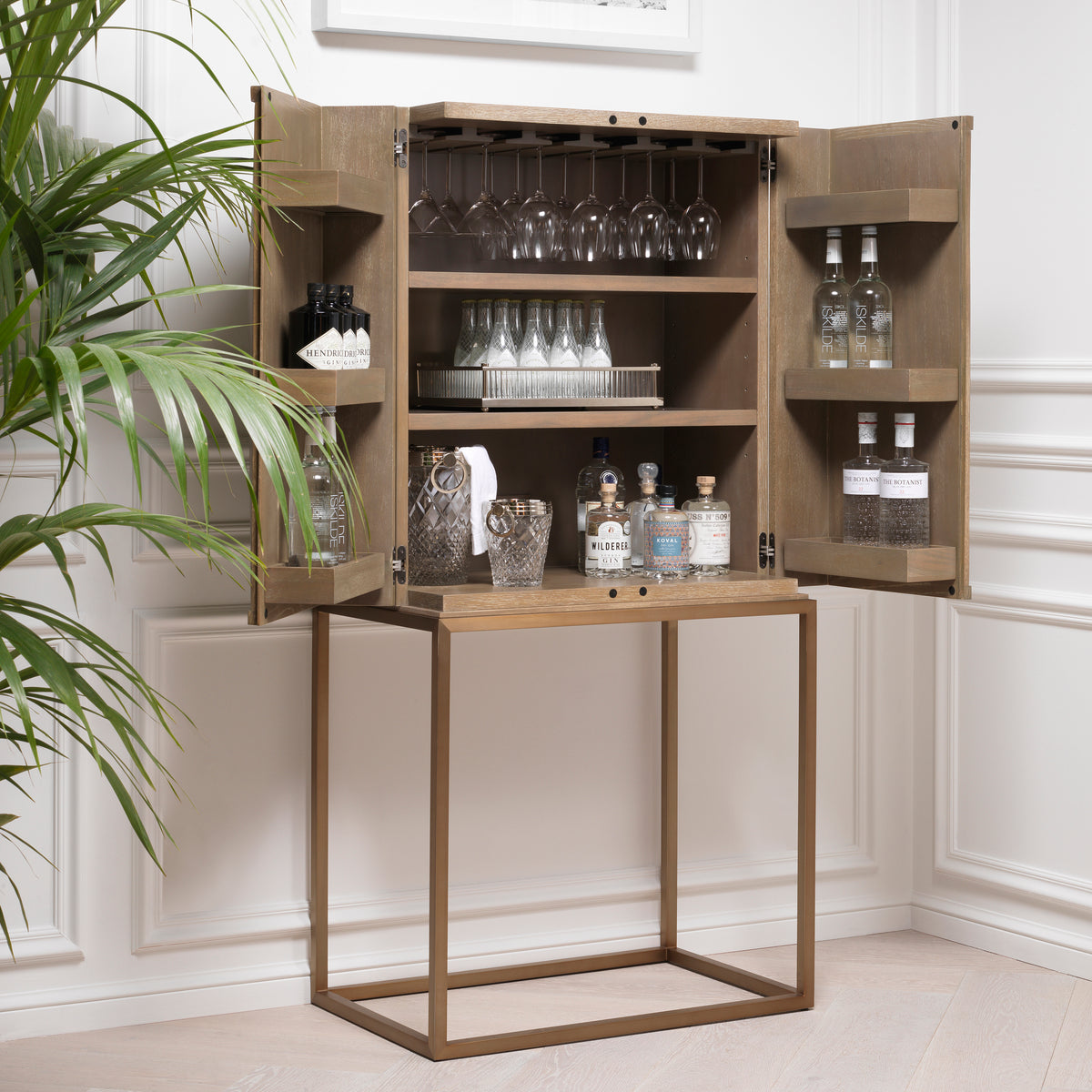Eichholtz Bar Cabinet Highland washed oak veneer Present your collection of liquors and wines in the Mid-Century Modern style Bar Cabinet Highland. W