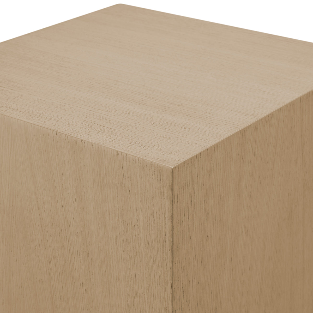 Beige cube with a textured surface on a white background