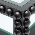 Coffee Table Kenton by Eichholtz in a styled setting — Solid Wood, Black, Clear Glass Top (Image 4)