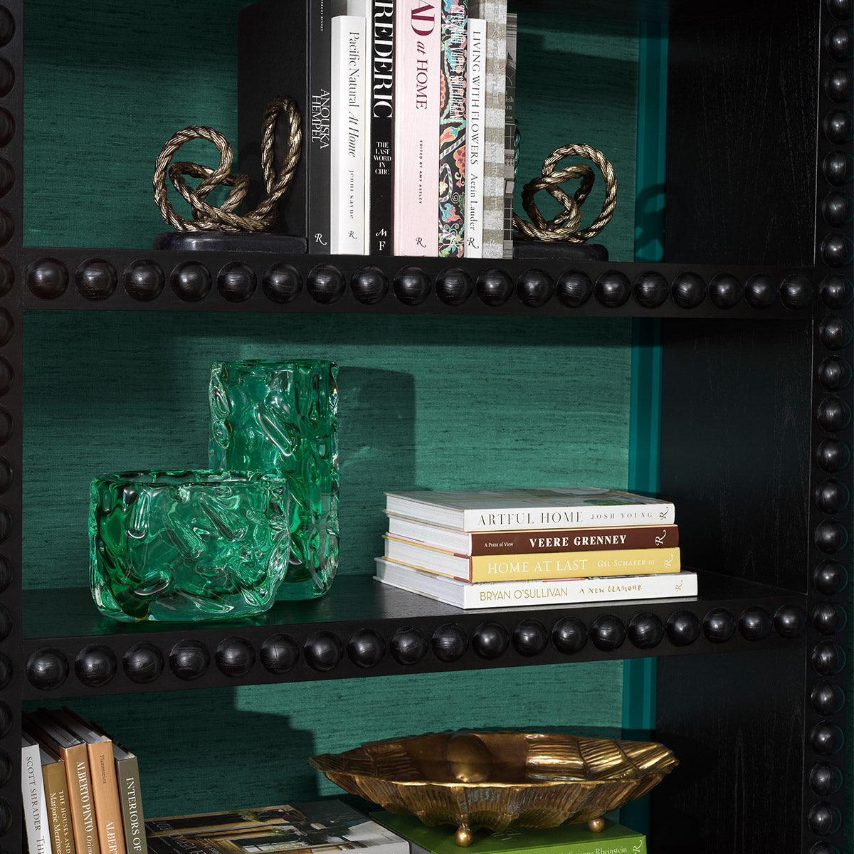 Lifestyle angle of Bookend Corwyn set of 2 with refined Antique Brass, Handcasted, Granite Base tones (Image 8)