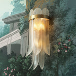 Lifestyle angle of Wall Lamp Erika with refined Antique Brass, Clear Glass tones (Image 8)