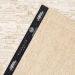 Packaging or detail view for Rug Featherstone 118.11" X 157.48" — Fabric & finish highlights (Image 7)