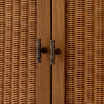 Eichholtz Bar Cabinet Borchard sophisticated blend of elegance and modernity. Adorned with exquisite rattan paneling, this high-end piece...