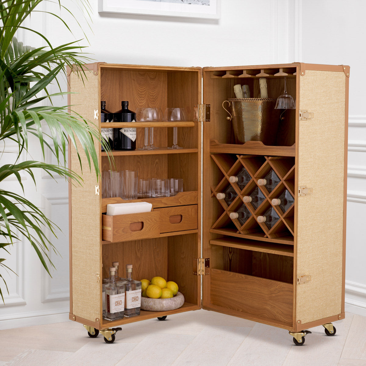 Eichholtz Bar Cabinet Martini Bianco its rattan look design, the gold finish hardware adds a touch of opulence while the