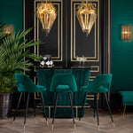 Eichholtz Bar Stool Avorio seat with button back and black tapered legs with brass caps, this vintage style furniture