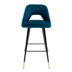 Eichholtz Bar Stool Avorio blue velvet upholstered seat with button back and black tapered legs with brass caps, this