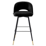 Eichholtz Bar Stool Cliff holds an armless back that is open at the bottom before the seat. Its stylish