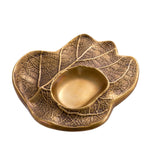 Eichholtz Bowl Clemence focal point on your coffee table. Provided with a vintage brass finish, it features an
