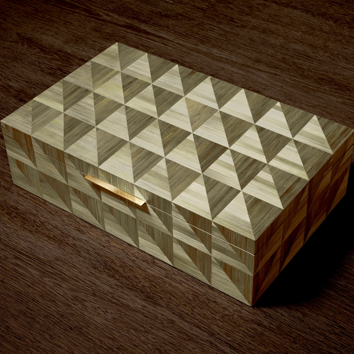 Eichholtz Box Hilgard transforms everyday storage into an artful statement. Its geometric elegance and natural hues invite sophistication,