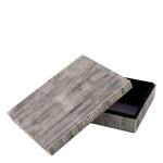 Eichholtz Box Lucille L bone, this large box boasts a captivating mosaic pattern, exuding timeless elegance. Its contrasting black