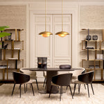 Eichholtz Cabinet Clio Round brass finish. This exceptional display cabinet stands as a testament to Eichholtz's commitment to luxury