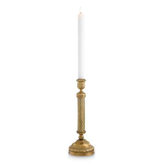 Eichholtz Candle Holder Carnier L The "Candle Holder Carnier L," in its vintage brass finish, boasts timeless charm inspired by