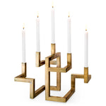 Eichholtz Candle Holder Skyline Elevate your living space with the iconic Eichholtz Candle Holder Skyline. This exclusive vintage brass
