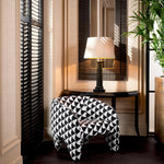Eichholtz Chair Toledo defines any living space. This striking chair is upholstered in Zenith black and white fabric,