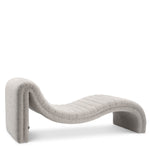 Eichholtz Chaise Longue Pioneer chaise finished in bouclé grey is the ideal addition to a bedroom or living room.
