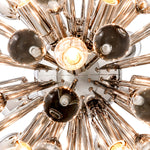 Eichholtz Chandelier Anto S ceiling lamp is adorned with massive spheres of clear glass. The armatures with shiny nickel