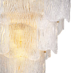 Eichholtz Chandelier Asinara L with the handcrafted Chandelier Asinara L by Eichholtz, where textured glass reflects a warm, radiant