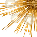 Eichholtz Chandelier Boivin rods with brass finish reflect the light of the light bulbs beautifully. This brilliant starburst