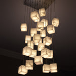 Eichholtz Chandelier Duboce In an antique brass finish, this chandelier features alabaster blocks that can be arranged in