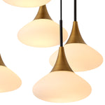 Eichholtz Chandelier Duco L white glass shades that cast an ambient light on your interior surroundings. The cables are
