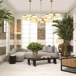 Eichholtz Chandelier Evergreen double brass finish, this chandelier exudes a regal charm that captivates the eyes. Adorned with eight