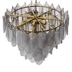 Eichholtz Chandelier Verbier S and smoke glass decorations not only fulfils its purpose of illuminating the room, but it