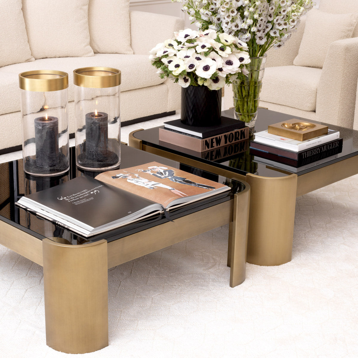 Eichholtz Coffee Table Courrier brass finish frame and black glass tabletop, this chic coffee table boasts a refined seventies