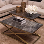 Eichholtz Coffee Table Criss Cross furniture piece has a brushed brass finish X-frame and a grey marble tabletop. Coffee Table