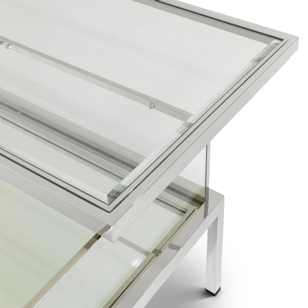 Eichholtz Coffee Table Harvey rectangular showcase decorative items. Comprising a polished stainless steel frame, it features a sliding d...