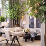 Eichholtz Coffee Table Lindner elevate any living space. The table is crafted from high-quality black veneer, giving it a