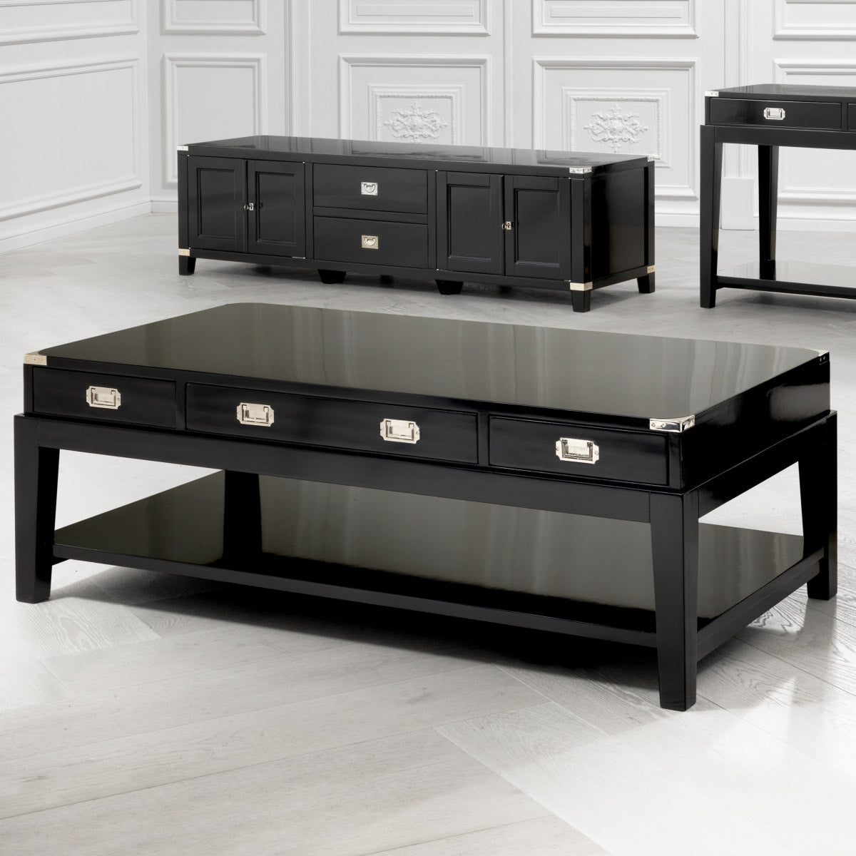 Eichholtz Coffee Table Military sturdy design in modern black timber finish with nickel hardware gives this coffee table timeless
