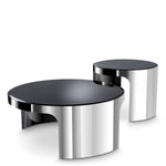 Eichholtz Coffee Table Piemonte set of 2 of bevelled black glass and a base of polished stainless steel, they will make a
