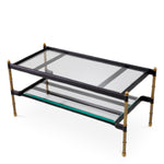 Eichholtz Coffee Table Princess rectangular living room ensemble. It has four slender legs with finials in a vintage brass finish