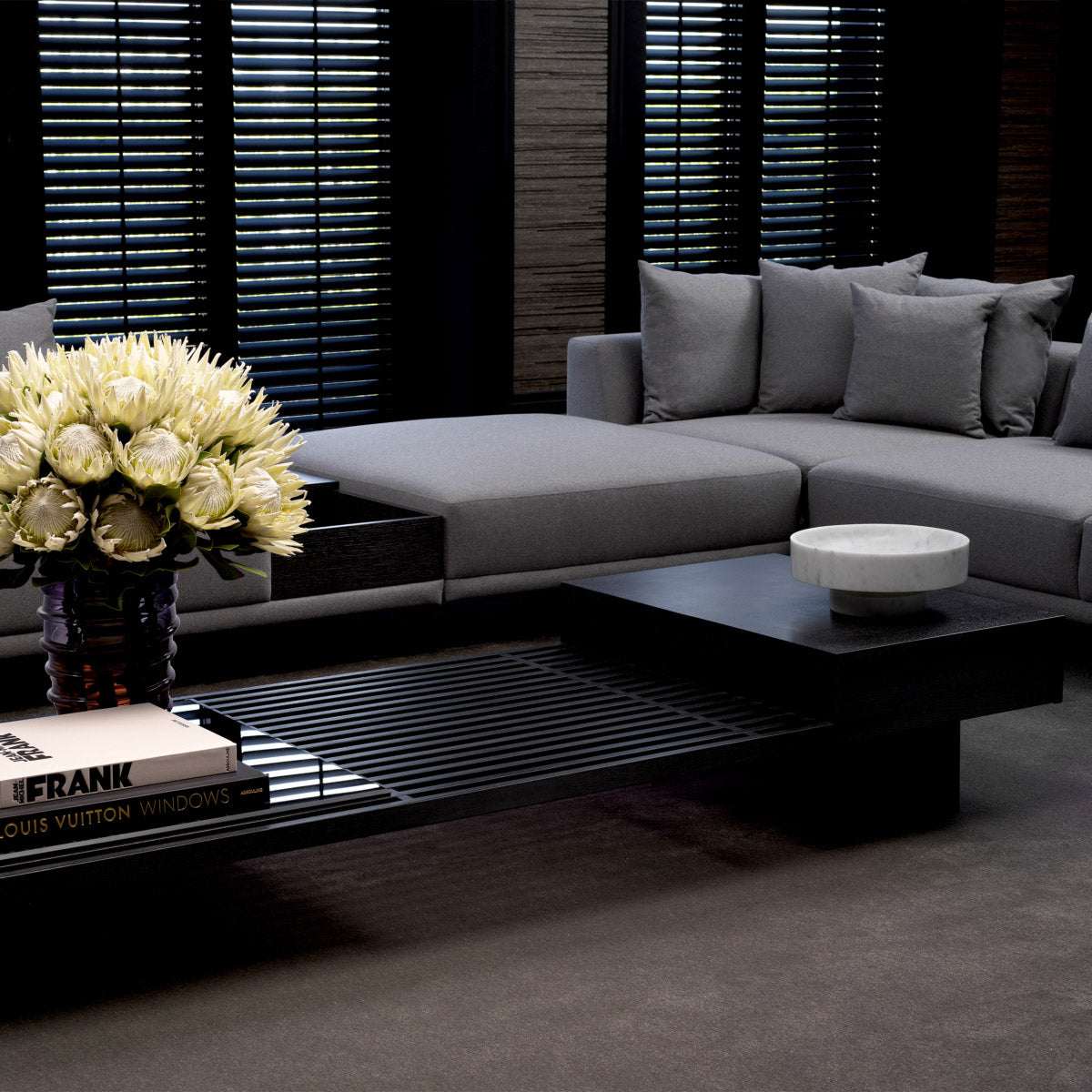 Eichholtz Coffee Table The Crest in cosmopolitan style. This rectangular charcoal oak veneer table features a smoke glass top and