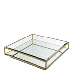 Eichholtz Coffee Table Tortona L by a sleek frame with a brushed brass finish, this sleek furniture piece features a