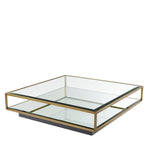 Eichholtz Coffee Table Tortona L tabletop of clear glass and a lower shelf of beveled mirror glass. Coffee Table Tortona