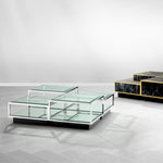 Eichholtz Coffee Table Tortona set of 4 Coffee Tables. Comprising two high and two low tables that are accented by a sleek
