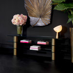 Eichholtz Console Table Lunden tempered glass shelves and a sturdy brushed brass finish frame, the 1930s art deco style