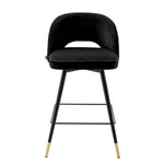 Eichholtz Counter Stool Cliff holds an armless back that is open at the bottom before the seat. Its stylish