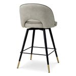 Eichholtz Counter Stool Cliff this barstool pairs refined design with elevated materials for a statement in any luxury interior.