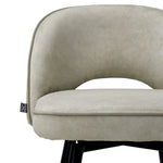 Eichholtz Counter Stool Cliff sophisticated grey piping and sleek black and brass-finished legs. Perfectly merging comfort and style, these