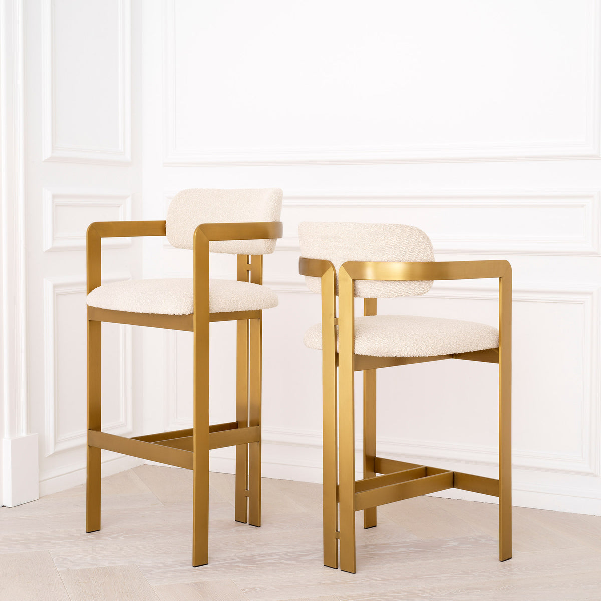 Eichholtz Counter Stool Donato a touch of vintage style to any space. Featuring a geometric brushed brass frame with