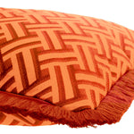 Eichholtz Cushion Doris S accentuated by dark orange fringe accents. The vibrant orange Doris print on a white backdrop